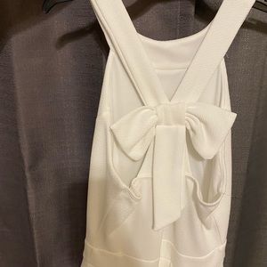 White dress. Bow on the back. S/M